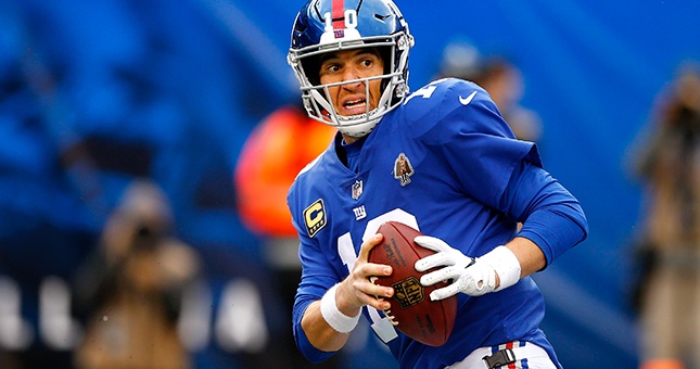 New York Giants quarterback Eli Manning (10) against the Washington Redskins during second half at MetLife Stadium.