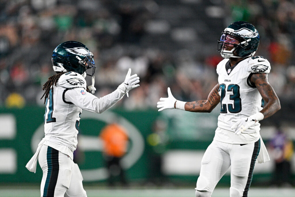 Philadelphia Eagles cornerback Eli Ricks (23) celebrates after the play with Philadelphia Eagles safety Andre' Sam (31)
