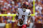 Commanders quarterback Jayden Daniels (5).