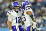 Minnesota Vikings tight end Bryson Nesbit (46) celebrates his touchdown with Minnesota Vikings quarterback Max Brosmer (12)
