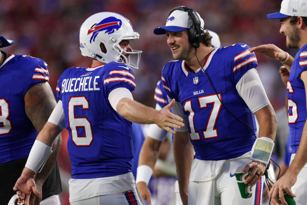 Buffalo Bills quarterback Shane Buechele (6) reacts with quarterback Josh Allen (17)