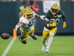 Green Bay Packers tight end Messiah Swinson (48) dives for a pass