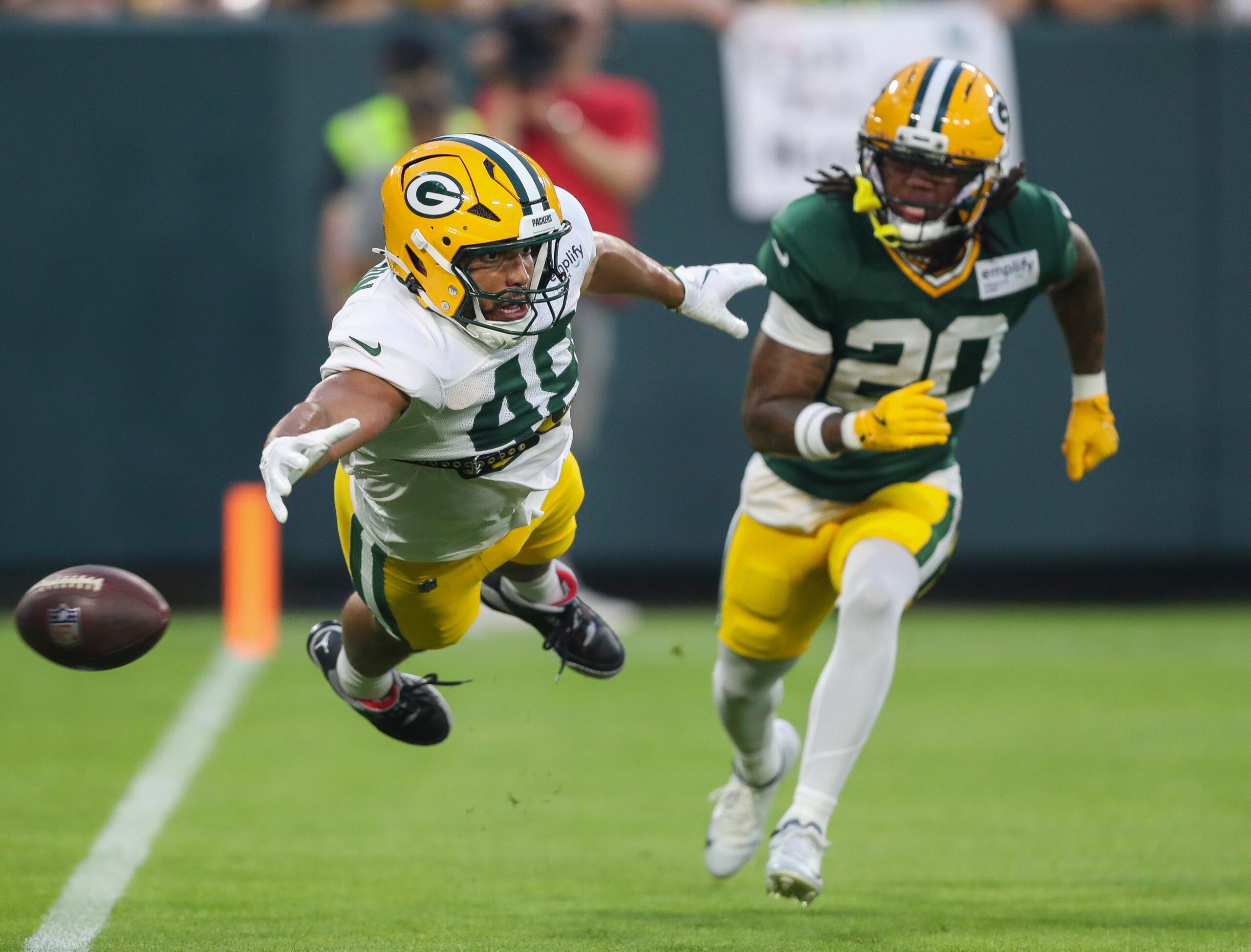Green Bay Packers tight end Messiah Swinson (48) dives for a pass