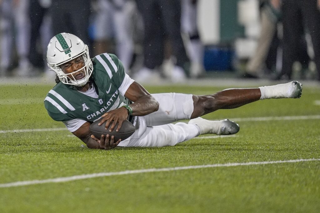 Sep 6, 2025; Charlotte, North Carolina, USA; Charlotte 49ers quarterback Conner Harrell (15) chases a fumbled snap