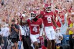 Oklahoma's Deion Burks (4) celebrates his touchdown