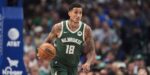 Milwaukee Bucks' Kyle Kuzma handles the ball during an NBA basketball game (AP Photo/Tony Gutierrez)