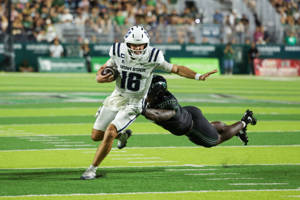 Utah State Aggies quarterback Bryson Barnes (16) Marco Garcia-Imagn Images