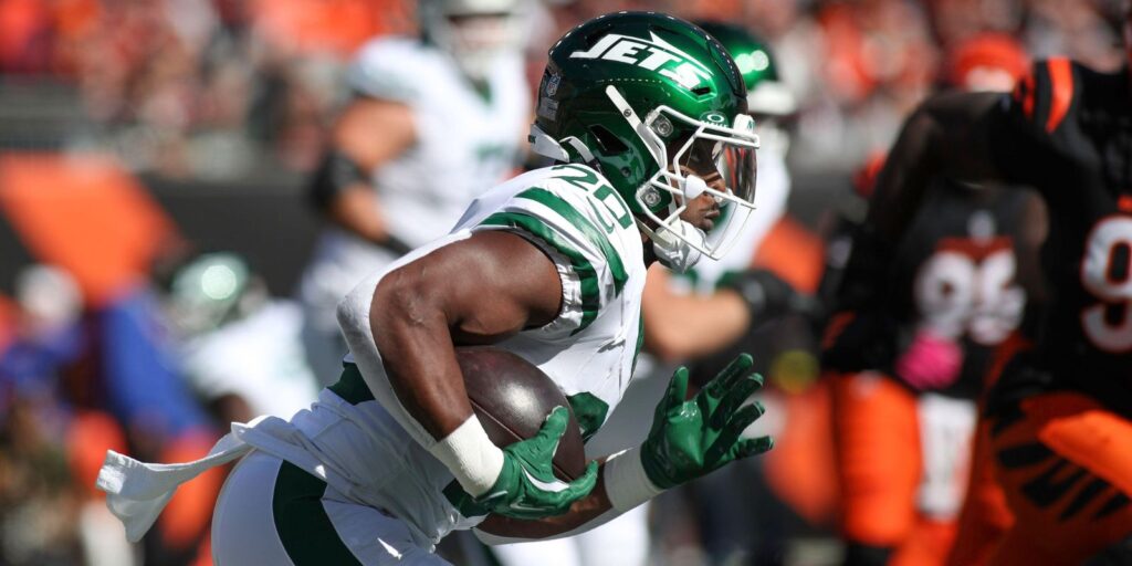 New York Jets RB Breece Hall runs the ball