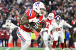 New England Patriots running back TreVeyon Henderson (32)