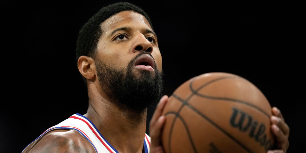 Philadelphia 76ers' Paul George shoots a free throw