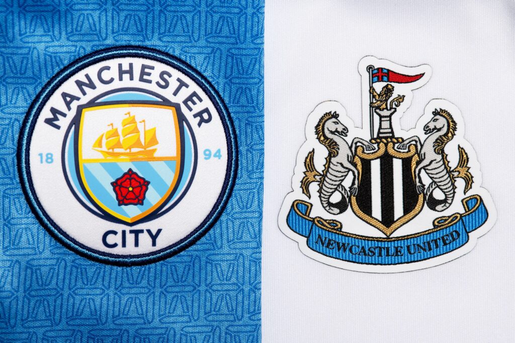 Close up of Manchester City and Newcastle United club crests