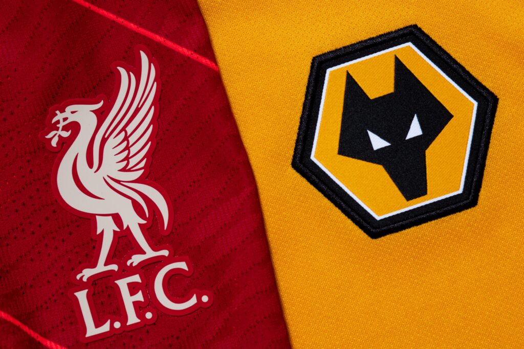 Close up of Wolves and Liverpool club crest