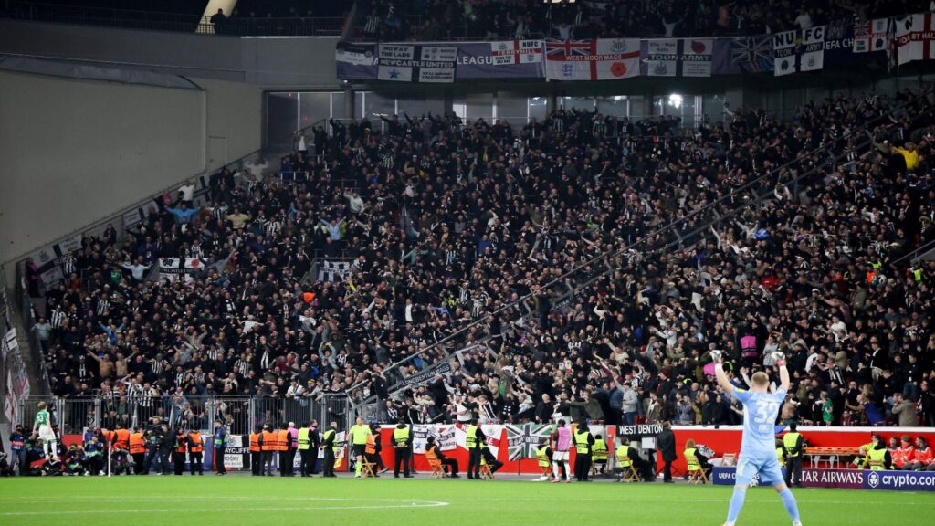 Newcastle Fans Celebrating a Goal