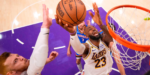 Lakers forward LeBron James shoots over Thunder's Isaiah Hartenstein